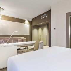 Отель NH Milano Touring комната для гостей фото 2