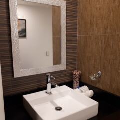 Отель Brisas 10 Beachside Suites ванная