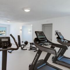 Отель Desiterra Suites and Villas фитнесс-зал