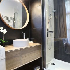 Отель Résidence Blanche Париж ванная фото 2
