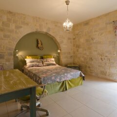 Отель Skalani Stone Houses комната для гостей