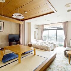 Kameyama Onsen Hotel Касаразу комната для гостей