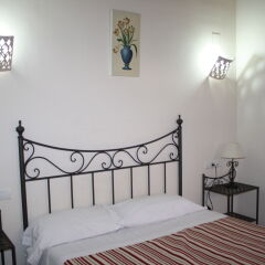 Отель Abadia Suites комната для гостей
