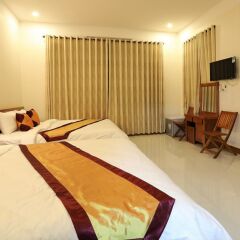 Отель Golden Sunbeam Homestay (Tia Nắng Vàng) Хойан комната для гостей фото 2