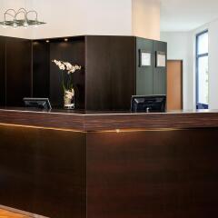 Отель NH München Airport Германия, Мюнхен - 1 отзыв об отеле, цены и фото номеров - забронировать отель NH München Airport онлайн интерьер отеля фото 3