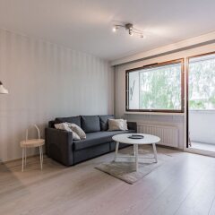 Апартаменты Local Nordic Apartments - Polar Bear Ювяскюля комната для гостей фото 4