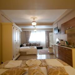 Отель Safran Suites Apart в номере фото 2