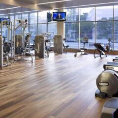 Отель Pan Pacific Serviced Suites Orchard, Singapore Сингапур, Сингапур - отзывы, цены и фото номеров - забронировать отель Pan Pacific Serviced Suites Orchard, Singapore онлайн фитнесс-зал фото 3