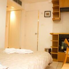 Отель Irwin Apartments at Notting Hill Великобритания, Лондон - отзывы, цены и фото номеров - забронировать отель Irwin Apartments at Notting Hill онлайн комната для гостей фото 5