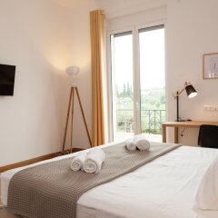 Отель Nakos Homes Luxury Apartment-Acropolis Area Греция, Афины - отзывы, цены и фото номеров - забронировать отель Nakos Homes Luxury Apartment-Acropolis Area онлайн комната для гостей