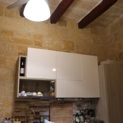 Отель Corto Maltese Guest House в номере