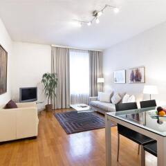 Апартаменты Jenatsch Apartments Цюрих комната для гостей фото 3