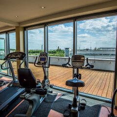 Отель Holiday Inn Berlin Airport - Conference Centre Шёнефельд фитнесс-зал фото 3