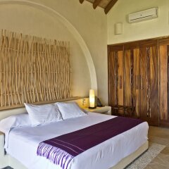 Отель Las Palmas Luxury Villas Мексика, Коакоюл - отзывы, цены и фото номеров - забронировать отель Las Palmas Luxury Villas онлайн комната для гостей фото 2