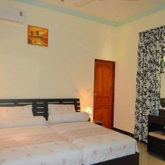 Отель Charming Holiday Lodge Мальдивы, Хулхудху (Атолл Адду) - отзывы, цены и фото номеров - забронировать отель Charming Holiday Lodge онлайн Хулхудху (Атолл Адду) комната для гостей фото 4