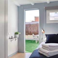 Апартаменты Habitat Apartments Attic Terrace Барселона комната для гостей фото 5