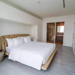 Отель M Suites by S Home Хошимин комната для гостей фото 3