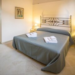 Отель Villa Lucrezio Resort Галатина комната для гостей фото 4