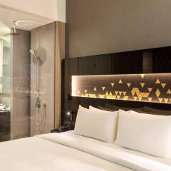 Отель Novotel Singapore on Stevens ванная фото 2