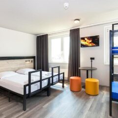 Отель a&o Berlin Mitte Германия, Берлин - 4 отзыва об отеле, цены и фото номеров - забронировать отель a&o Berlin Mitte онлайн комната для гостей фото 4