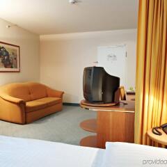Steigenberger Airport Hotel комната для гостей фото 2