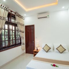 Отель Tra Que Flower Homestay Вьетнам, Хойан - отзывы, цены и фото номеров - забронировать отель Tra Que Flower Homestay онлайн интерьер отеля