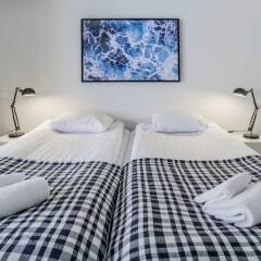 Апартаменты Kotimaailma Apartments Albertinkatu 27B комната для гостей
