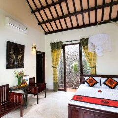 Отель Bonsai Homestay Хойан комната для гостей фото 5