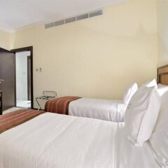 Отель Al Majaz Premiere Deluxe Hotel Apartment ОАЭ, Шарджа - отзывы, цены и фото номеров - забронировать отель Al Majaz Premiere Deluxe Hotel Apartment онлайн комната для гостей фото 2