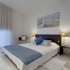 Отель Marvellous Apartment in Tigne Point With Pool Мальта, Слима - отзывы, цены и фото номеров - забронировать отель Marvellous Apartment in Tigne Point With Pool онлайн комната для гостей фото 5