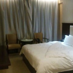Отель Jinxing Holiday Hotel - Zhongshan Китай, Чжуншань - отзывы, цены и фото номеров - забронировать отель Jinxing Holiday Hotel - Zhongshan онлайн комната для гостей фото 4
