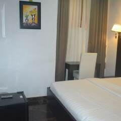 Отель Mac Dove Lounge & Suites ltd комната для гостей фото 4