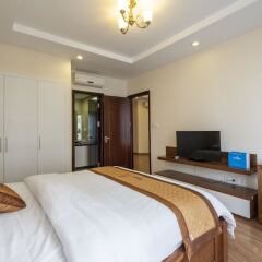 Апартаменты Bayhomes Times City Serviced Apartment комната для гостей