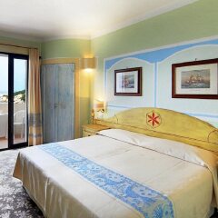 Отель Grand Hotel Smeraldo Beach Италия, Байя-Сардиния - 1 отзыв об отеле, цены и фото номеров - забронировать отель Grand Hotel Smeraldo Beach онлайн комната для гостей фото 5
