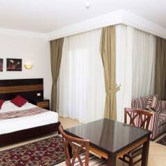 Апартаменты Pyramisa Sunset Pearl Apartments комната для гостей фото 3