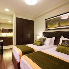 Отель Movenpick Hotel Apartments Al Mamzar Dubai ОАЭ, Дубай - 4 отзыва об отеле, цены и фото номеров - забронировать отель Movenpick Hotel Apartments Al Mamzar Dubai онлайн комната для гостей