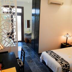 Отель Hoi An Tnt Villa Хойан комната для гостей фото 2