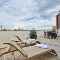 Отель Jules Suites Сан Джулианс бассейн