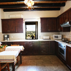Отель Leonidas Village Houses в номере