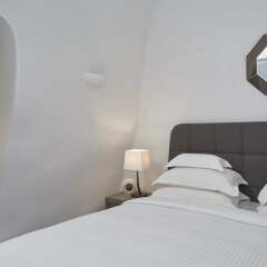 Отель Eden Villas By Canaves Oia Греция, Остров Санторини - отзывы, цены и фото номеров - забронировать отель Eden Villas By Canaves Oia онлайн комната для гостей фото 5
