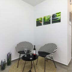 Апартаменты Mirage City Apartments Родос комната для гостей фото 5