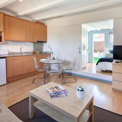 Апартаменты Habitat Apartments Attic Terrace Барселона комната для гостей фото 2