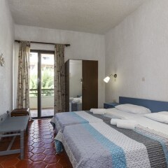 Апартаменты Emmanuel Apartments Родос комната для гостей фото 3