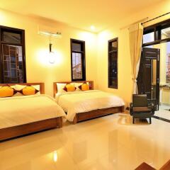 Отель Golden Sunbeam Homestay (Tia Nắng Vàng) Хойан комната для гостей фото 3
