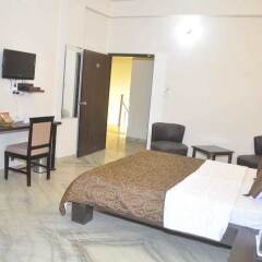 Отель Jypore Saffron Inn & Suites комната для гостей фото 4