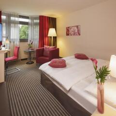 Mövenpick Hotel München-Airport комната для гостей фото 6