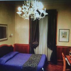 Отель Relais Conte Di Cavour De Luxe комната для гостей