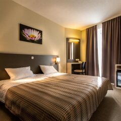 Отель Corvin Hotel Budapest - Corvin wing Венгрия, Будапешт - отзывы, цены и фото номеров - забронировать отель Corvin Hotel Budapest - Corvin wing онлайн комната для гостей фото 2