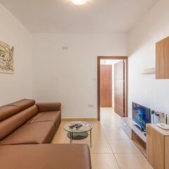 Отель Seashells 2-Bedroom Apartment Мальта, Буджибба - отзывы, цены и фото номеров - забронировать отель Seashells 2-Bedroom Apartment онлайн комната для гостей фото 5