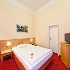 Отель Novum Hotel Gates Berlin Charlottenburg Германия, Берлин - 13 отзывов об отеле, цены и фото номеров - забронировать отель Novum Hotel Gates Berlin Charlottenburg онлайн комната для гостей фото 4